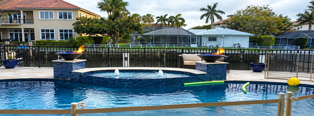 Waterfront pool with spa, bubblers and fire bowls