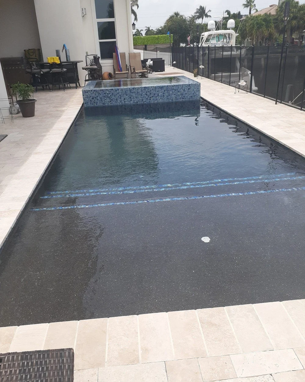 Pool with a dark interior finish
