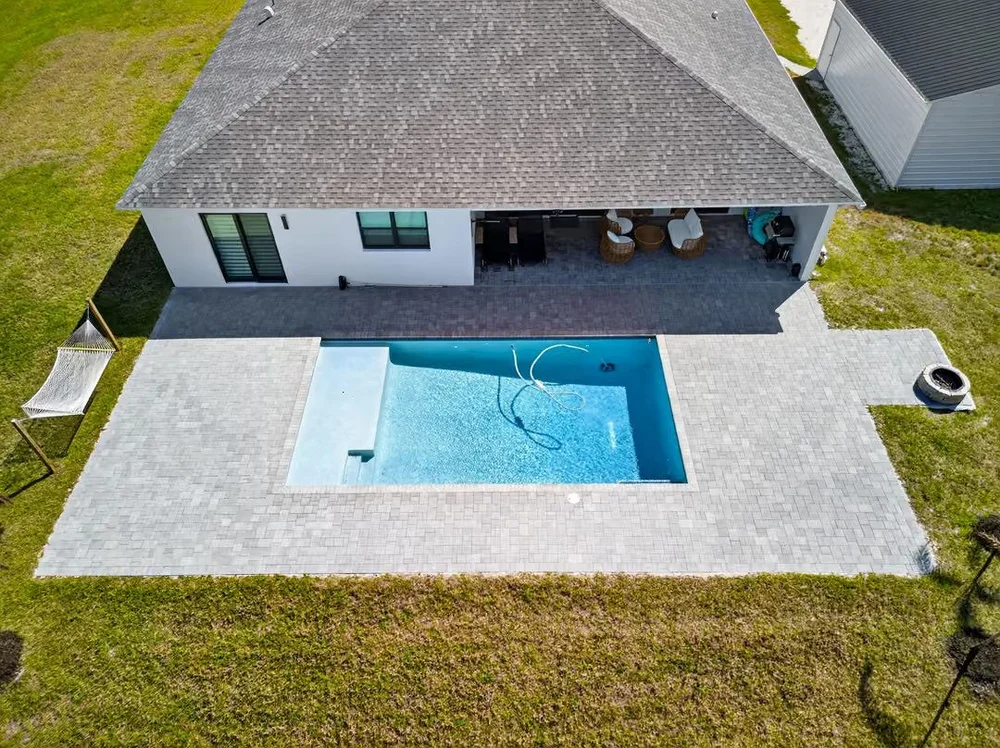 Aerial view of a new pool and patio