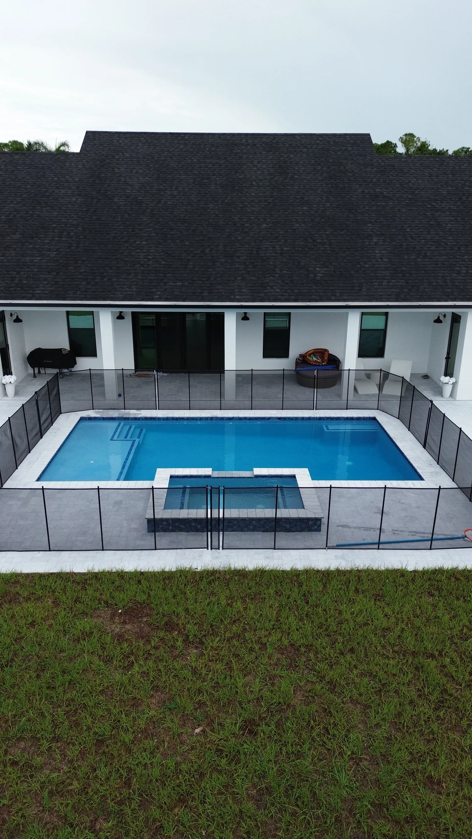 New-construction home with fenced pool and spa
