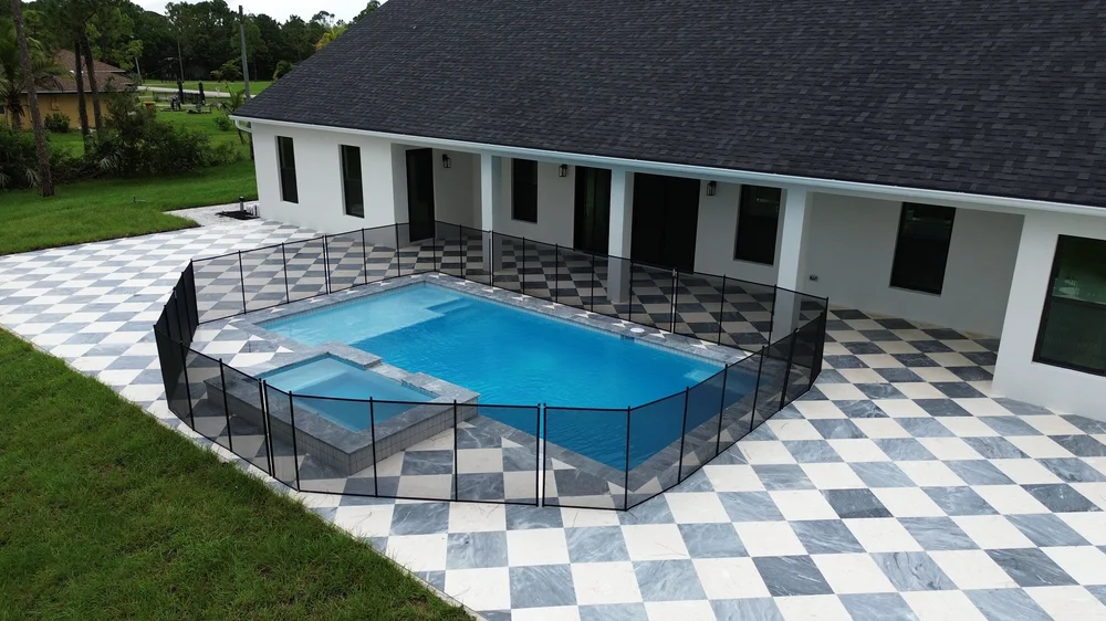 New pool and spa with checkered deck