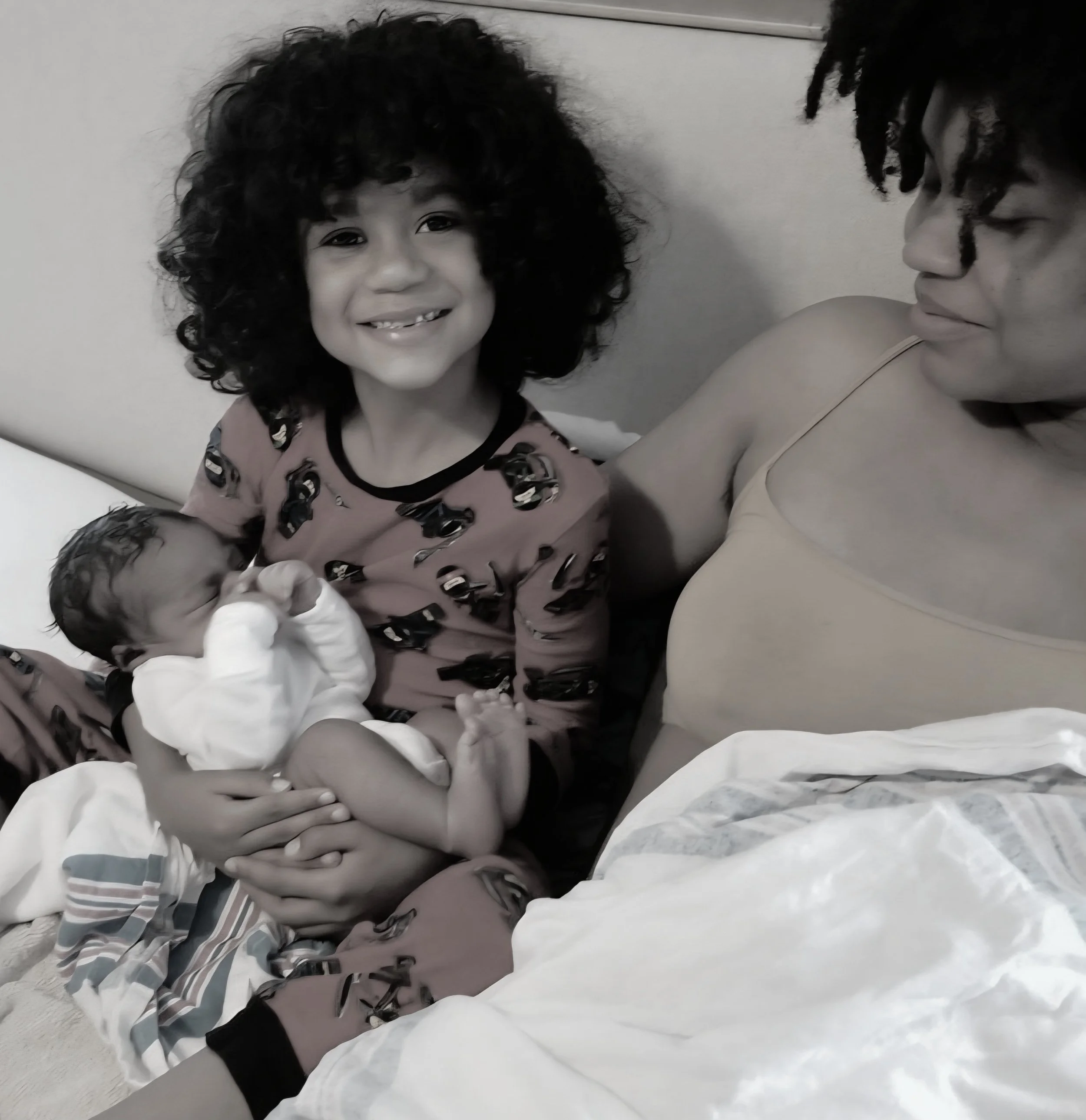 family bonding with newborn baby after birth