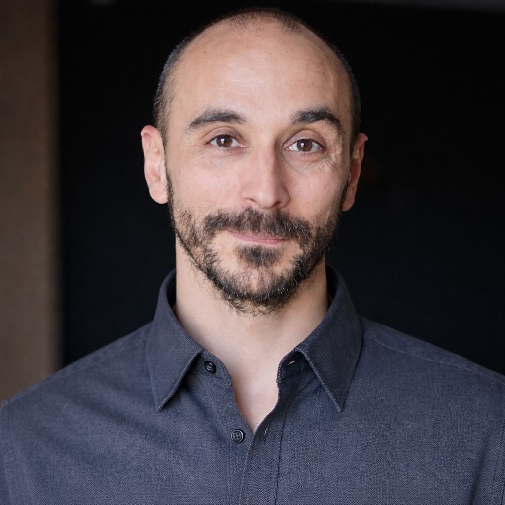 Professional headshot portrait of Dr. Mauro Cavarra, PhD, psychotherapist, clinical researcher, and expert in altered states of consciousness.