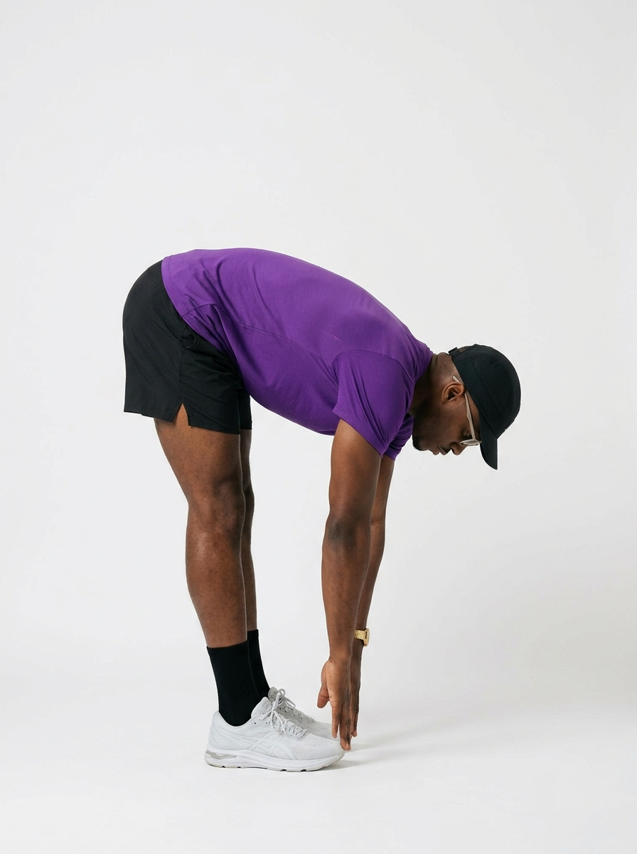 Man_bending_reaching_toward_floor_202606251035 1.png