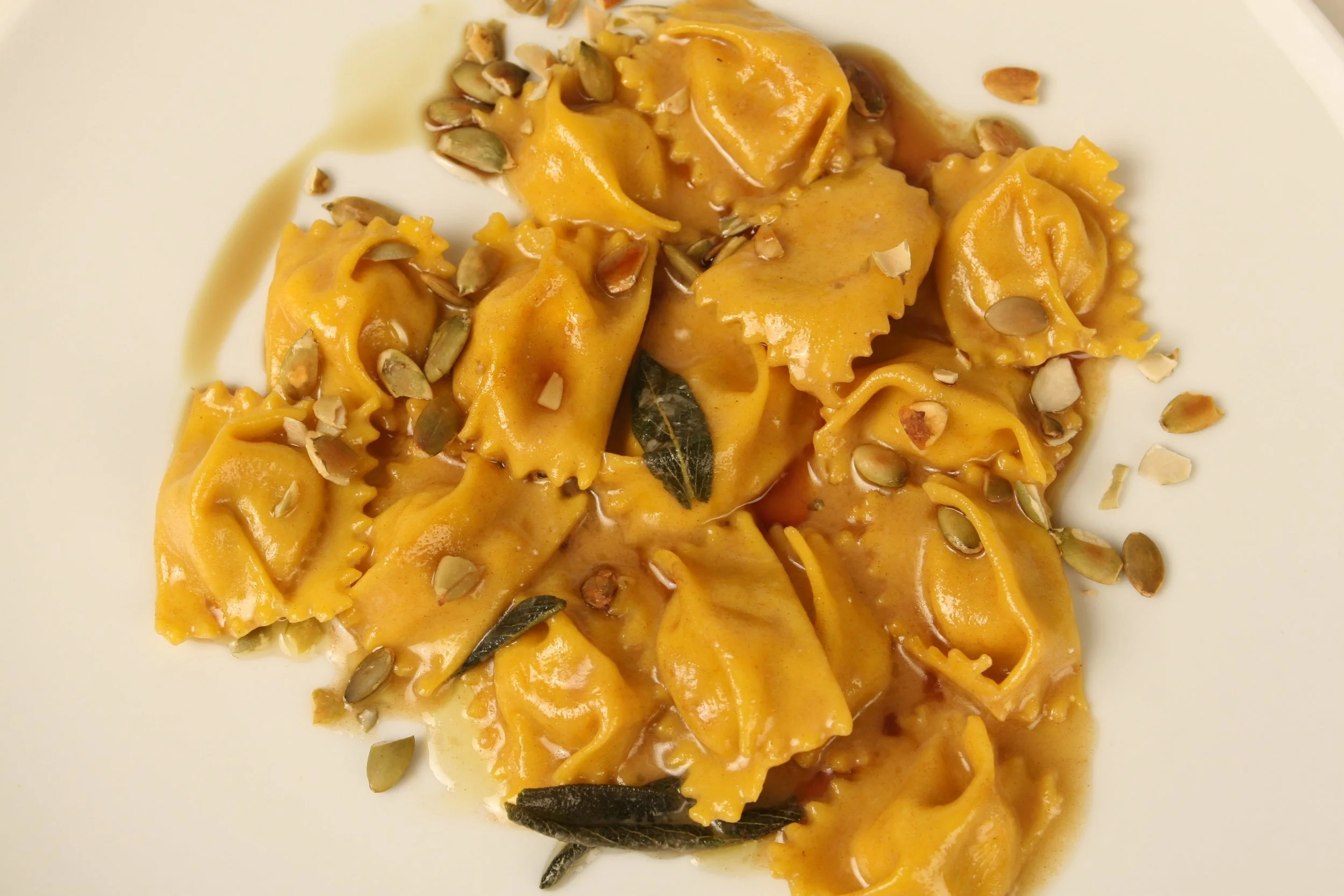 Pumpkin Agnolotti with Brown Butter, Sage, and Toasted Pumpkin Seeds. 