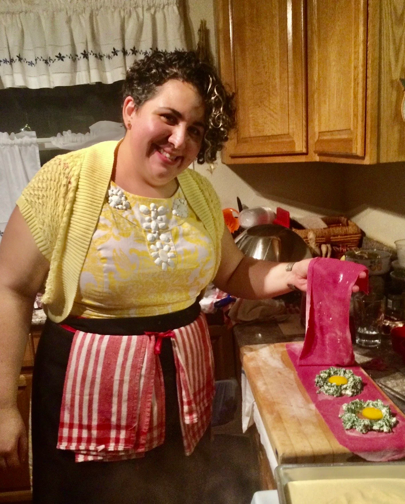 Isabella making uovo e raviolo.