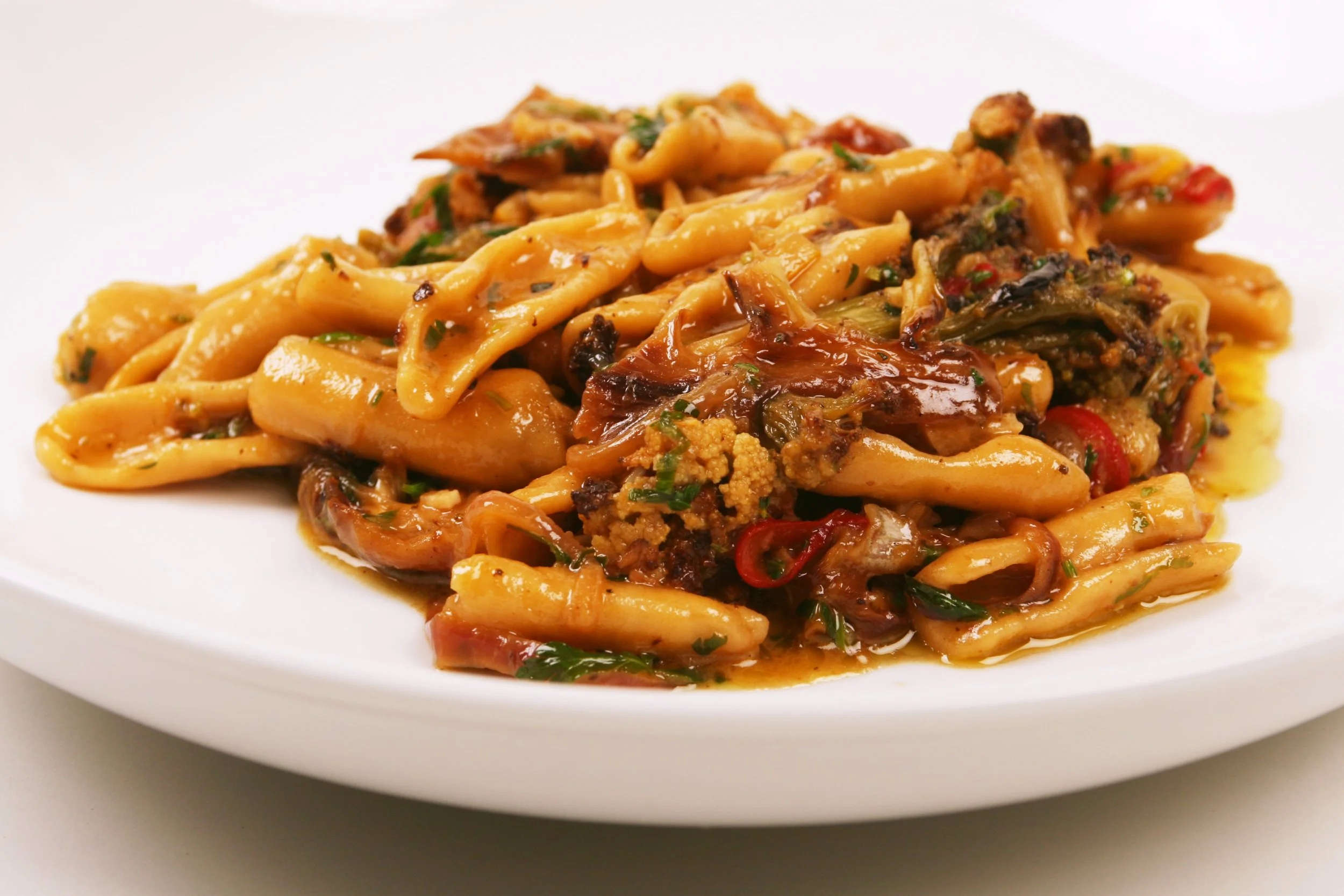 Capunti di Grano Arso with Romanesco, Calabrian Chili, and Meyer Lemon. 
