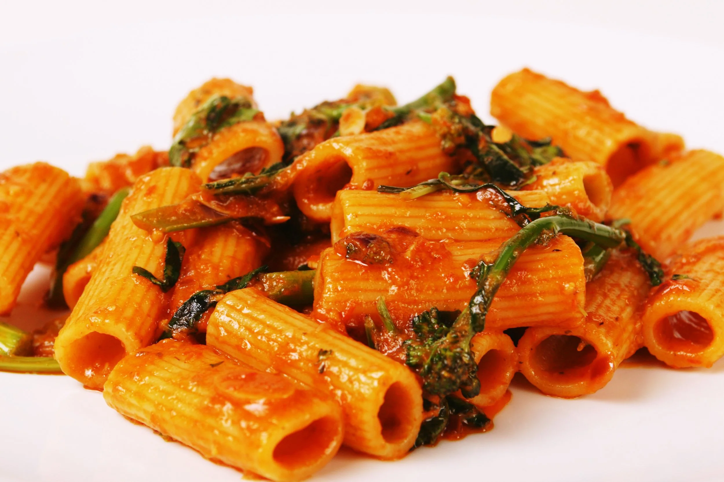 Rigatoni with Spicy Pomodoro Sauce, Anchovy, and Rapini. 