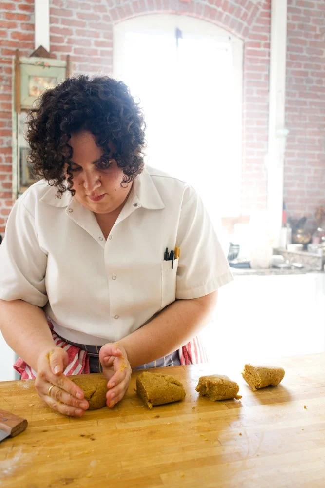 Isabella making passatelli.
