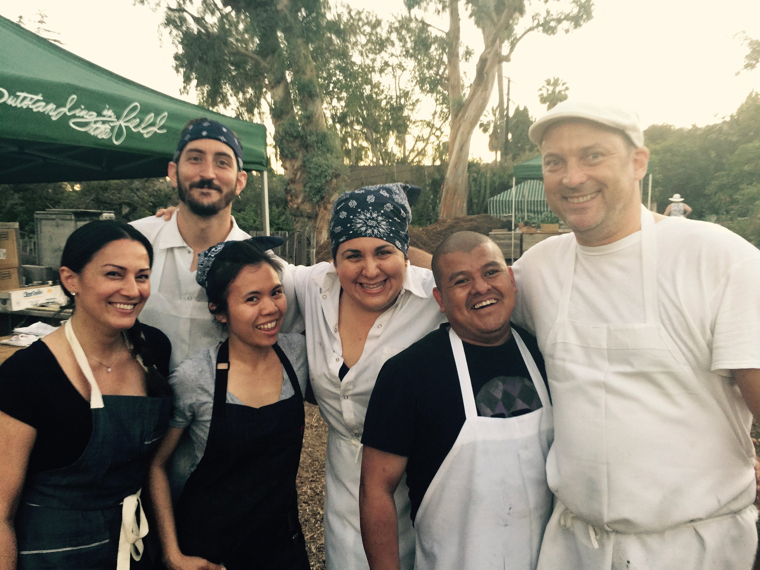 Isabella with chef colleagues from Sotto and Angelini Osteria at Outstanding in the Field Dinner. 