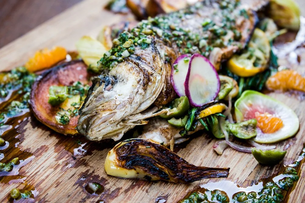 Grilled Branzino, Roasted Fennel, Watermelon Radish, Salsa Verde, and Tangerine.