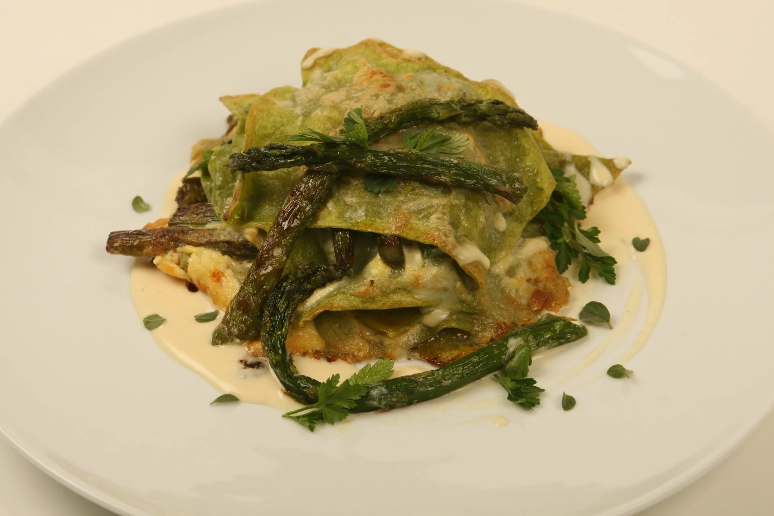 Lasagnetta with Lamb Ragù Bianco, Pecorino Gran Cru Fonduta, Asparagus, and Thyme.