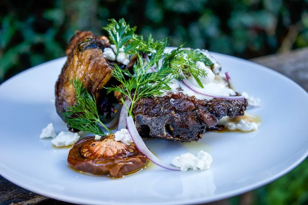 Slow-Roasted Lamb Neck, Tzatziki, Feta, Dehydrated Tomatoes, and Dill.