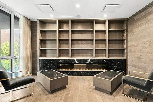 Library with fireplace at 1399 Park Avenue, Upper East Side NYC luxury building amenities
