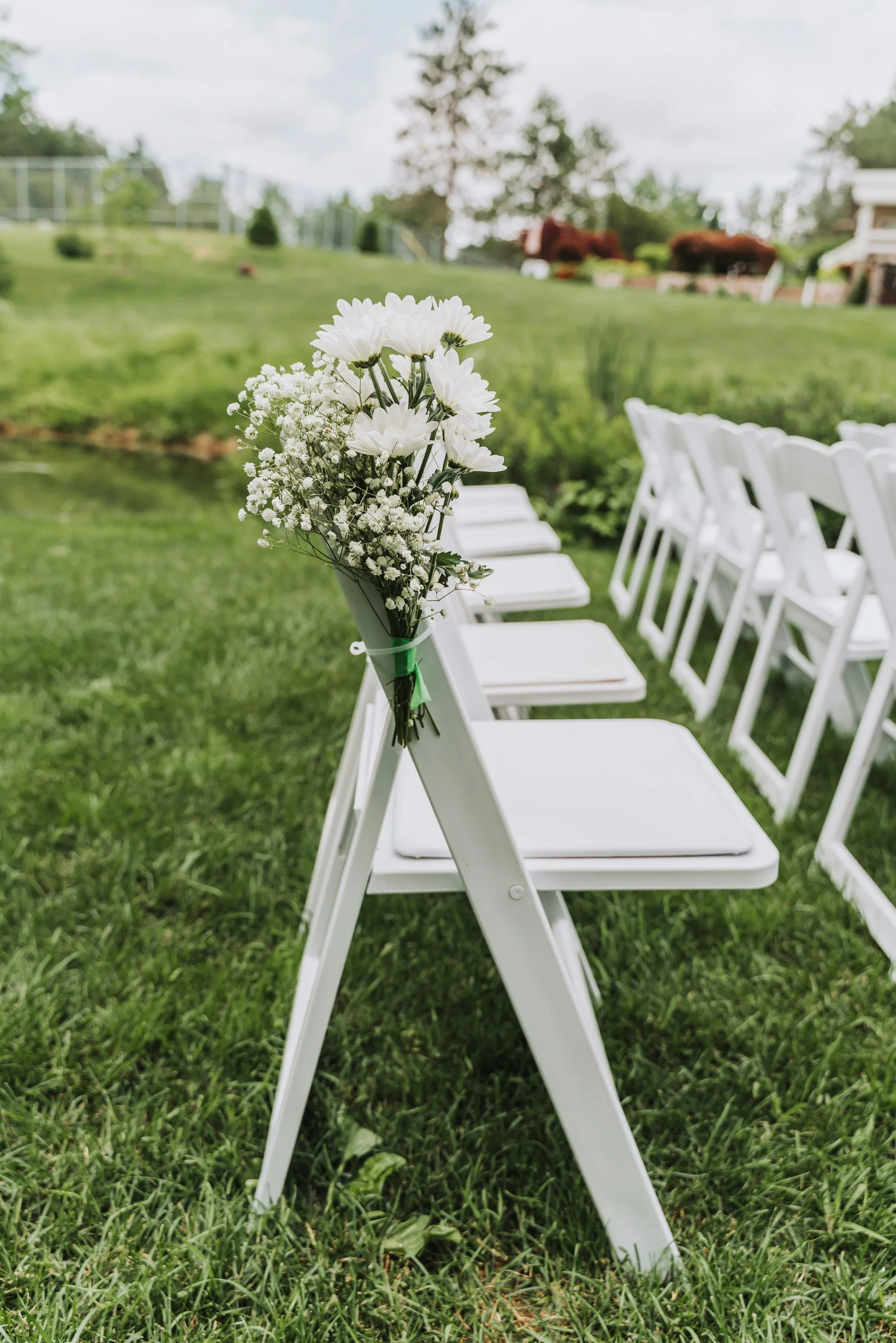 Outdoor Ceremony Setup | North Atlanta — White Resin Chairs