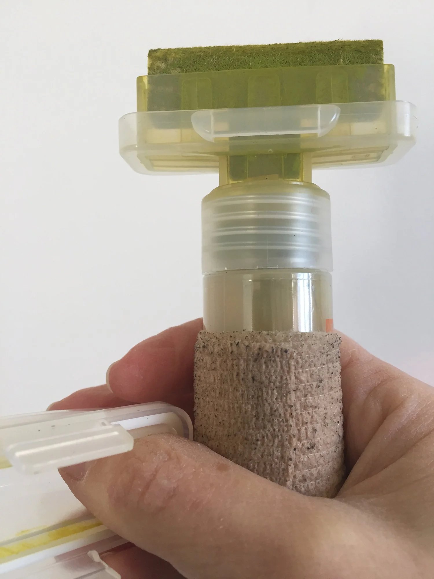 Figure 20:Joy. Custom-mixed Neuland dry-erase ink in a 50mm Montana case, wrapped with cohesive flexible elastic to help secure my grip. 2015.