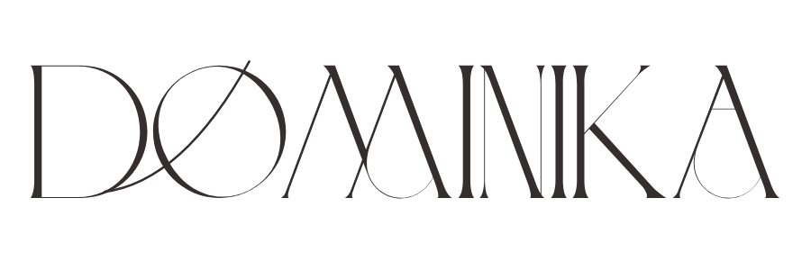Stylized black and gray text spelling 'DOMANKA' with an artistic font.