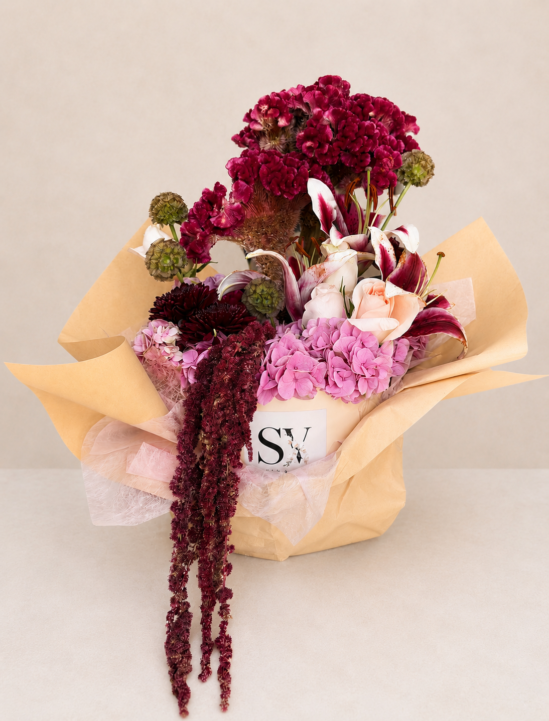 Luxury wrapped bouquet featuring hydrangeas and sculptural florals by Stem & Vine Studio Moorestown NJ.
