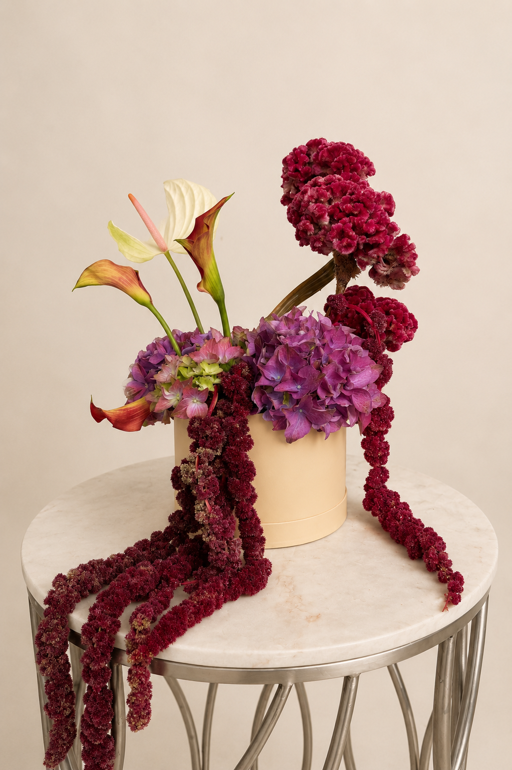 Luxury floral arrangement featuring hydrangeas, anthuriums, and cascading amaranthus by Stem & Vine Studio in Moorestown NJ.
