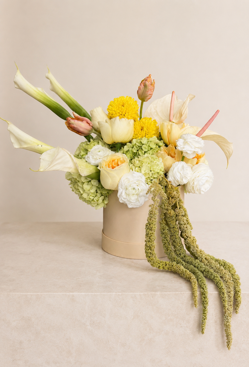 Editorial floral arrangement with calla lilies and roses by luxury florist Stem & Vine Studio.