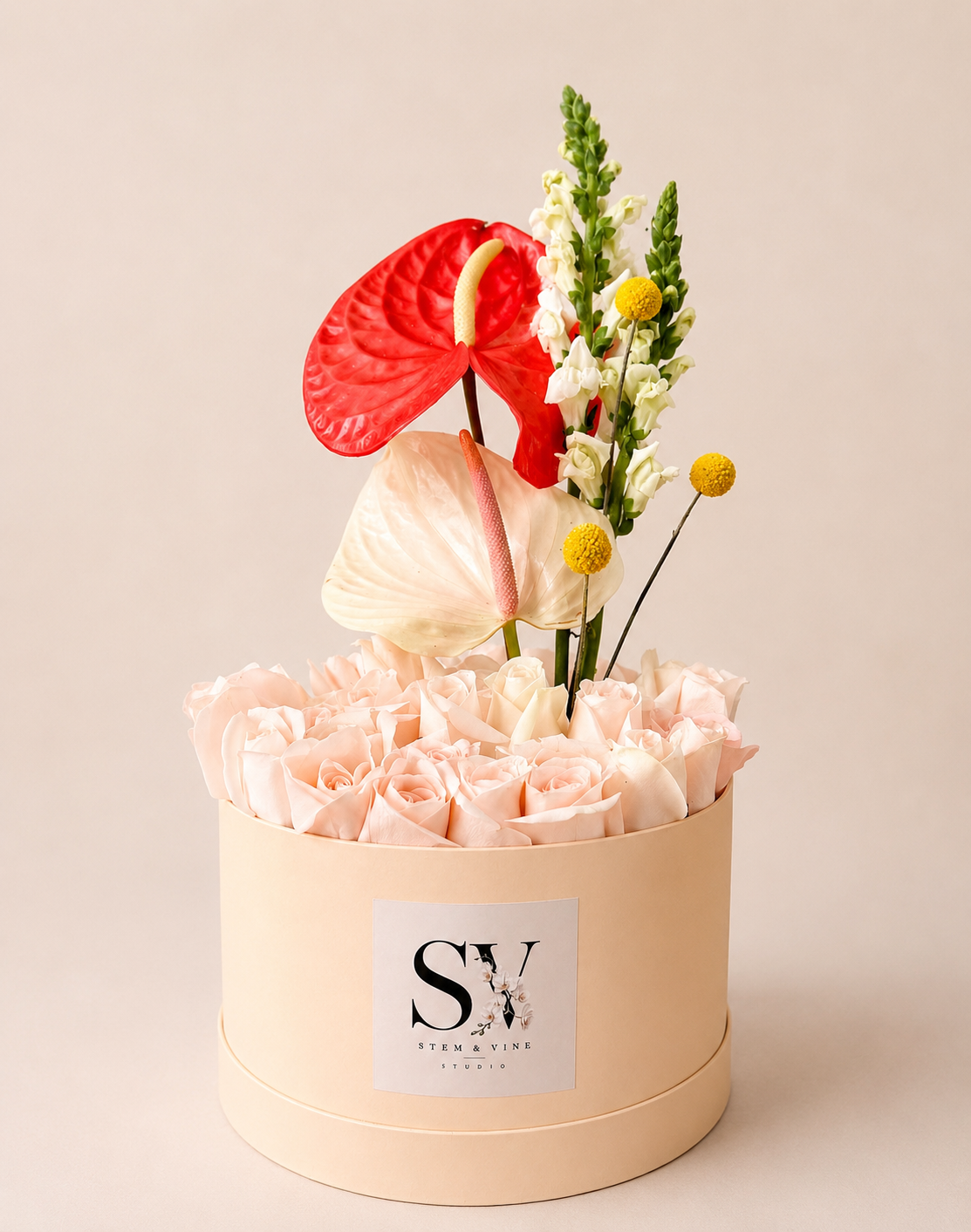 Modern luxury rose arrangement with calla lilies and anthuriums by Stem & Vine Studio Moorestown NJ.