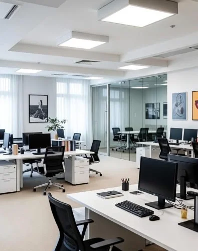 an image of a generic office space with computers and desks