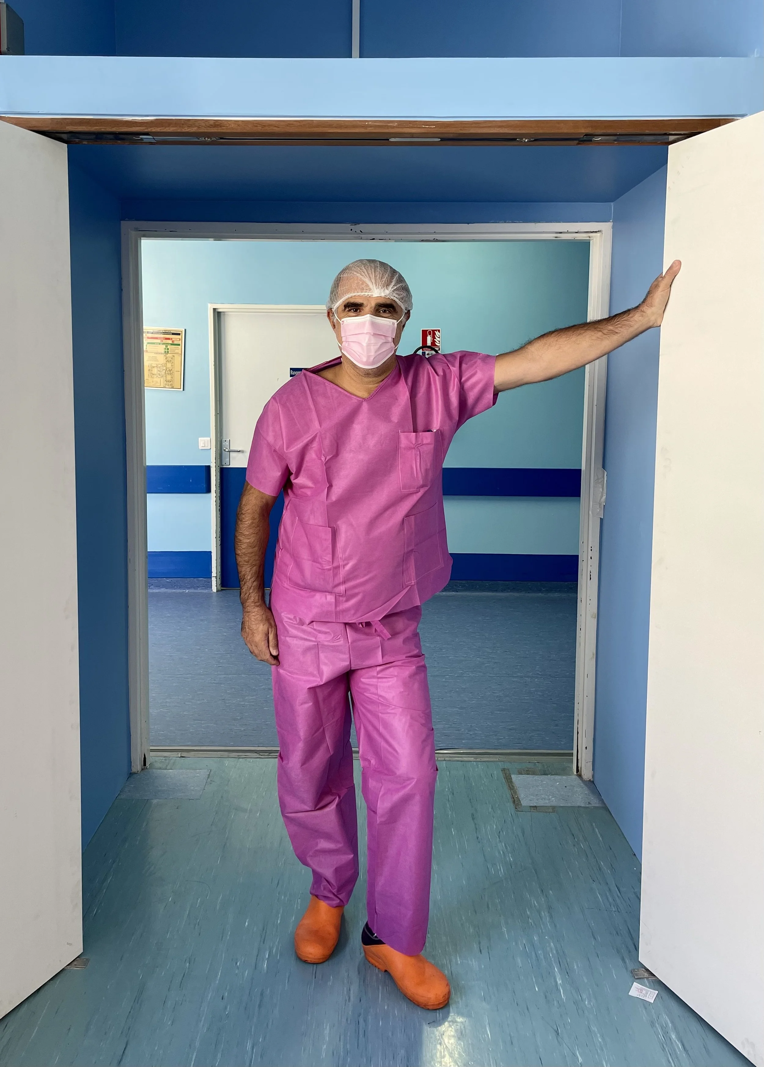 Dr. Emre Belli in Fashionable Scrubs