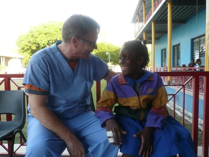 Dr. Gil Wernovsky and patient in Jamaica. 