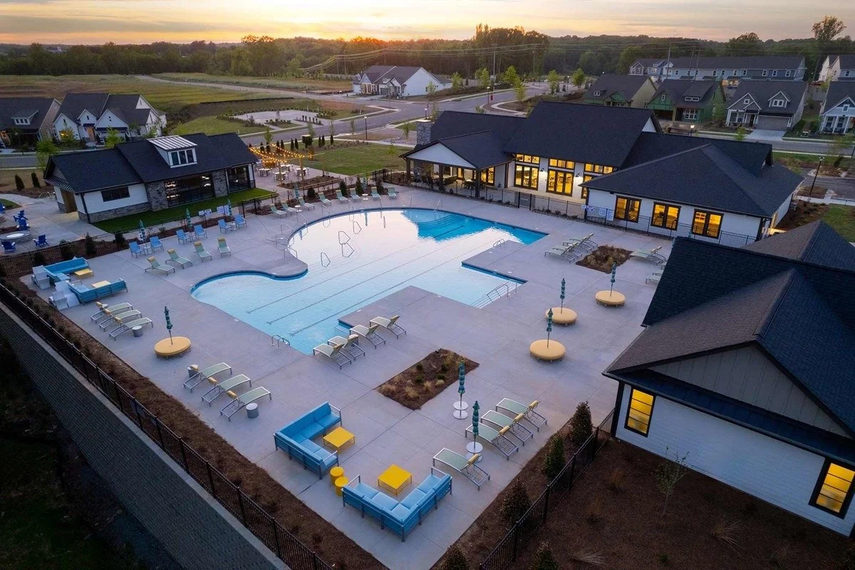 encore-at-streamside-aerial-view-of-clubhouse-and-pool-at-dusk-active-adult-community-waxhaw-nc.jpg