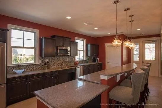 courtyards-of-marvin-model-home-kitchen-with-island-and-pendant-lights-active-adult-community-marvin-nc.jpg