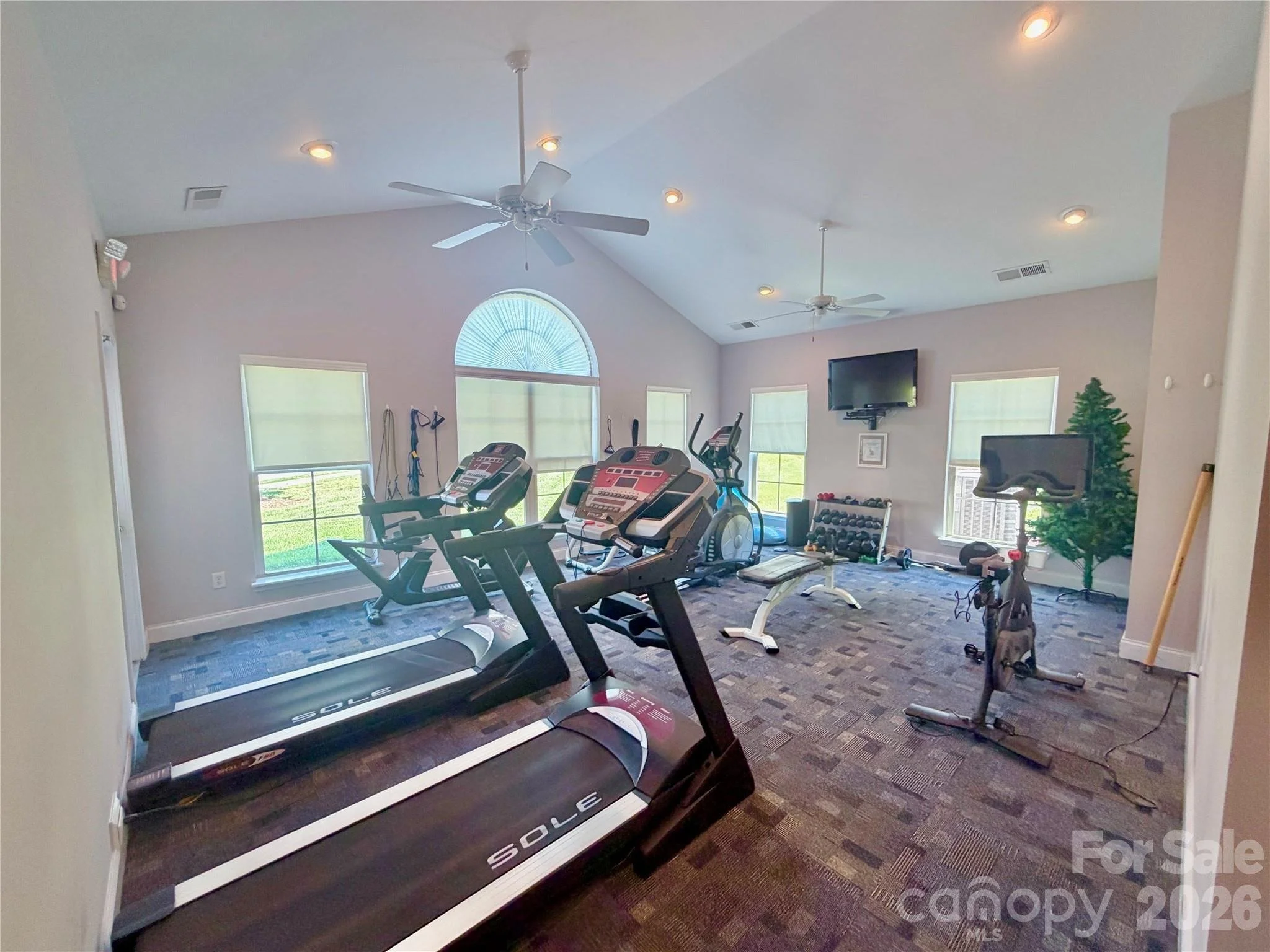 polo-club-at-mountain-island-lake-fitness-room-with-treadmills-and-exercise-equipment-active-adult-community-charlotte-nc.jpg