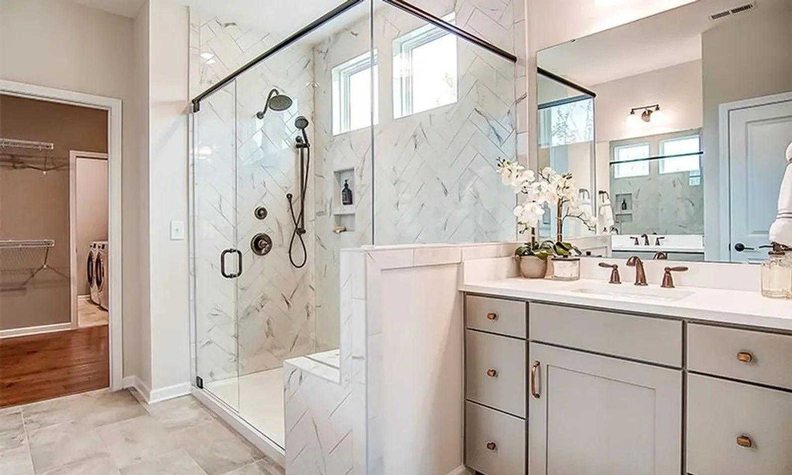 heritage-in-indian-trail-primary-bathroom-with-glass-shower-and-double-vanity-active-adult-community-indian-trail-nc.jpg