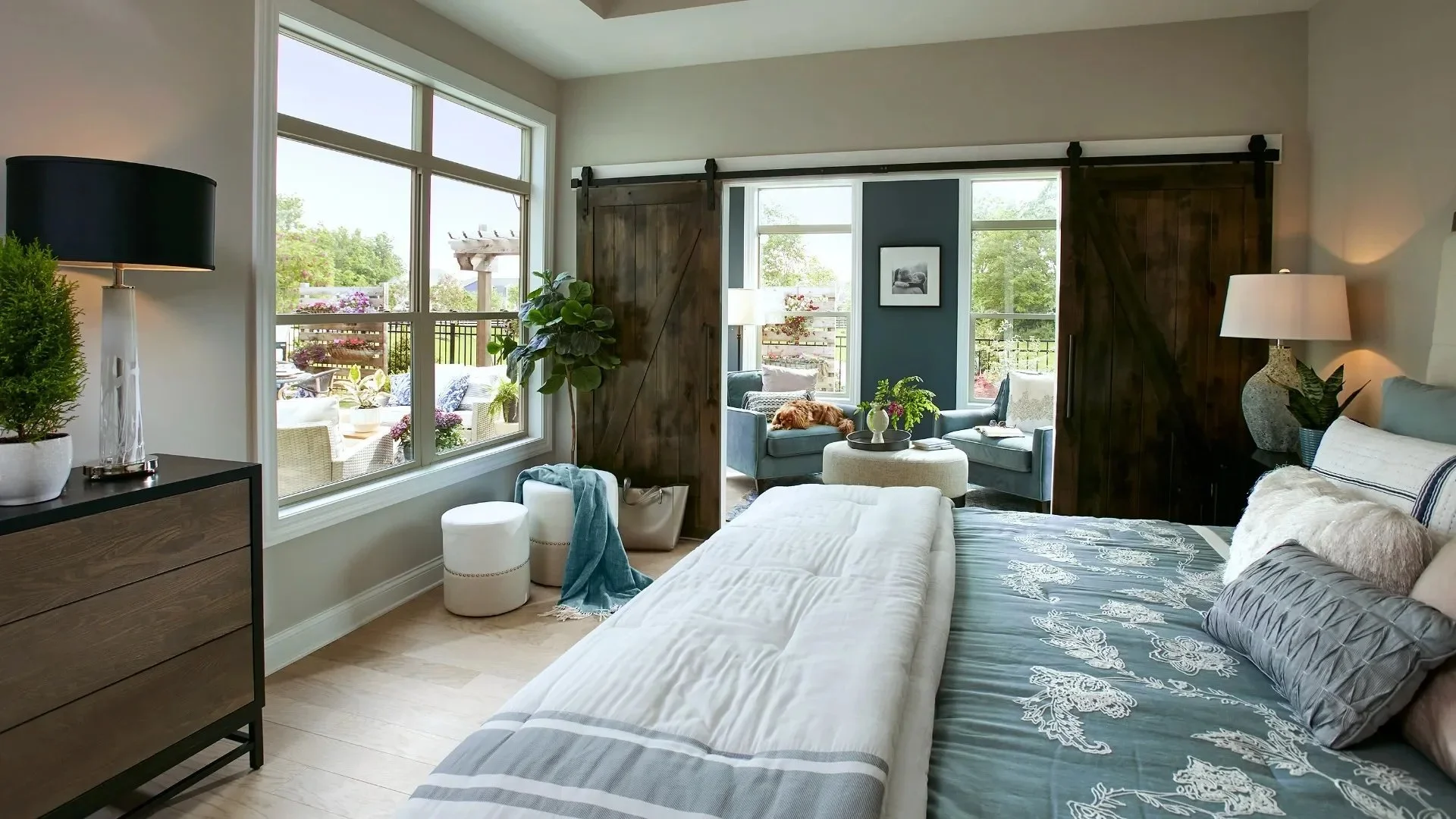 courtyards-55-plus-community-owners-suite-barn-door-patio-view-charlotte-nc.webp