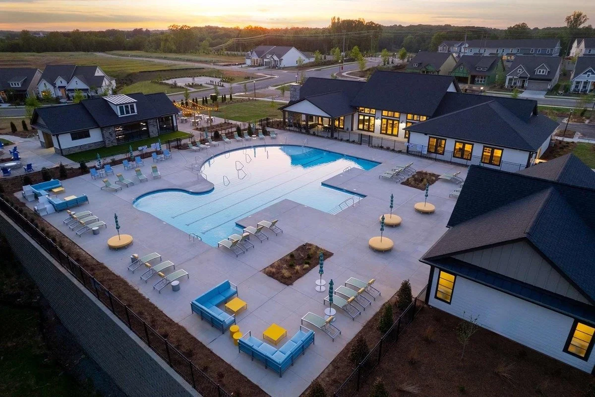 encore-at-streamside-aerial-view-of-clubhouse-and-pool-at-dusk-active-adult-community-waxhaw-nc.jpg