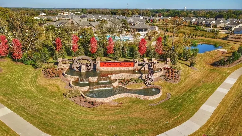 carolina-orchards-active-adult-community-aerial-view-of-entrance.webp