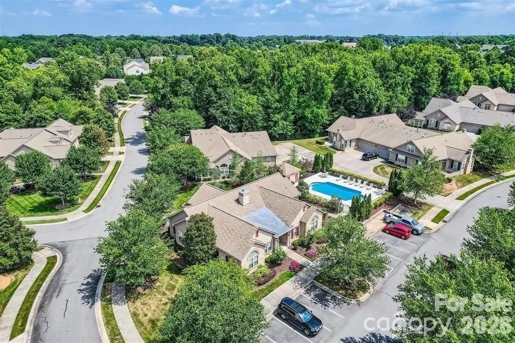 polo-club-at-weddington-aerial-view-of-neighborhood-street-and-homes-active-adult-community-weddington-nc.jpg