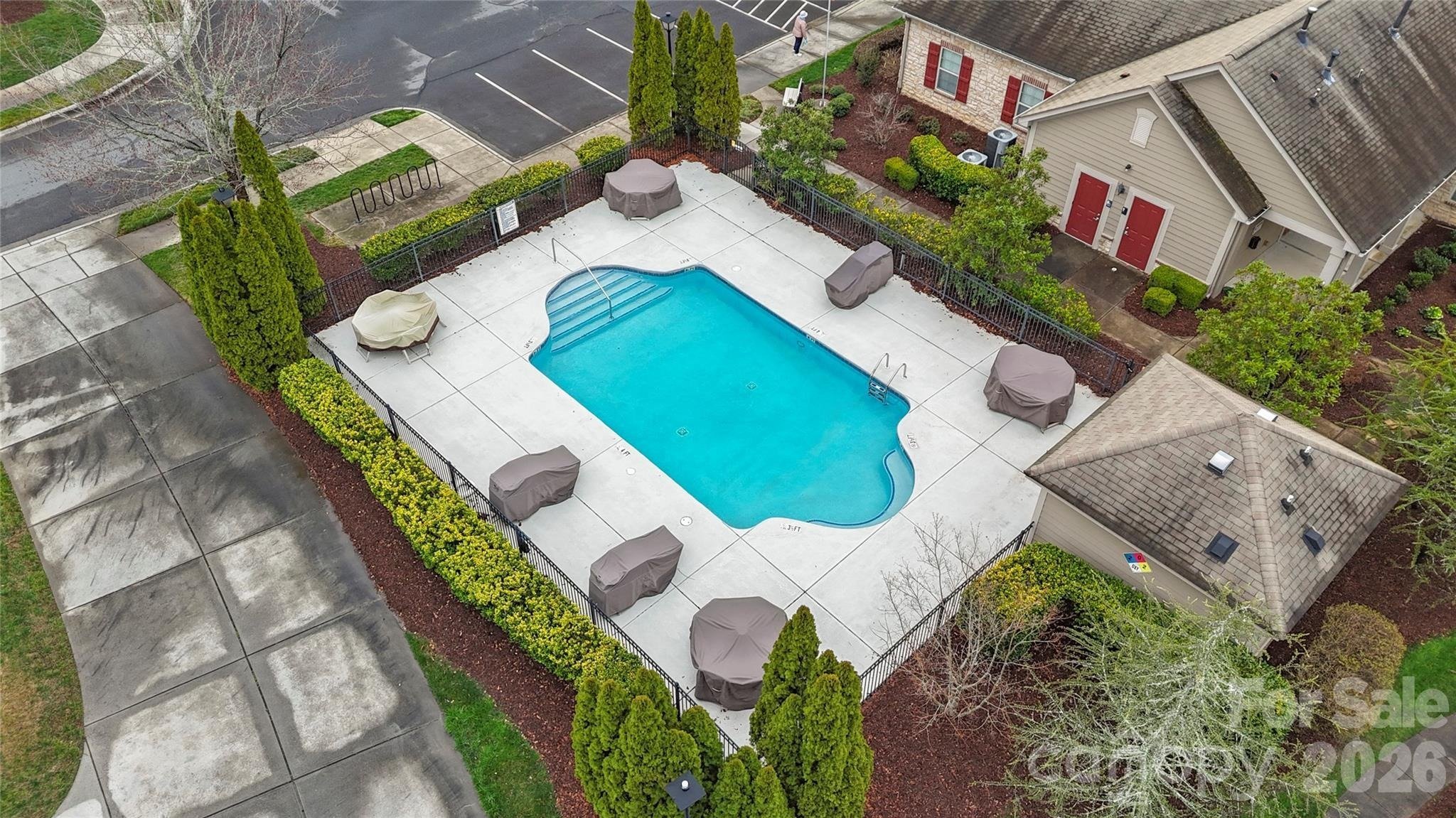 polo-club-at-weddington-aerial-view-of-community-pool-and-clubhouse-active-adult-community-weddington-nc.jpg