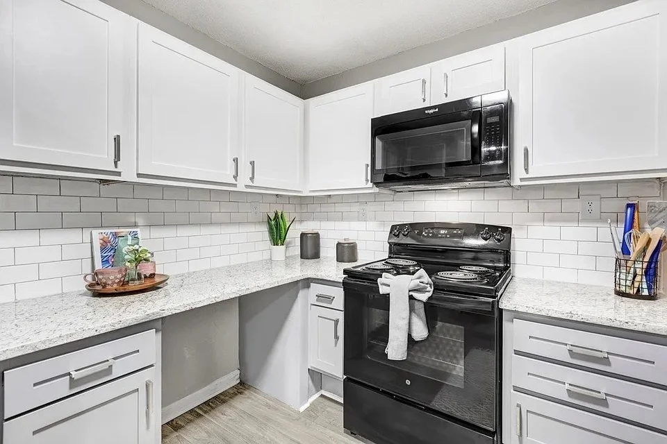 polo-club-at-weddington-white-kitchen-with-subway-tile-backsplash-active-adult-community-weddington-nc.jpg