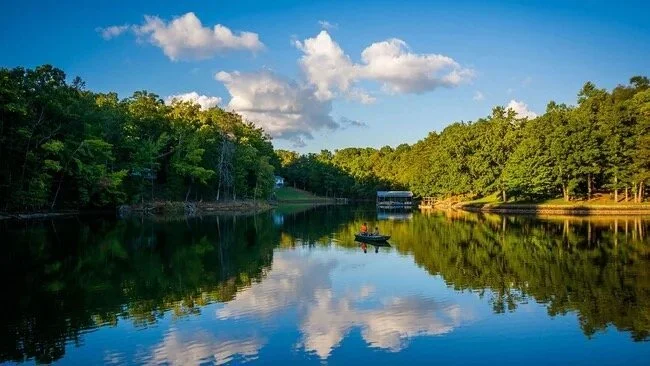 tree-tops-lancaster-lake-view-with-small-boat-and-tree-reflections-lancaster-sc.jpg