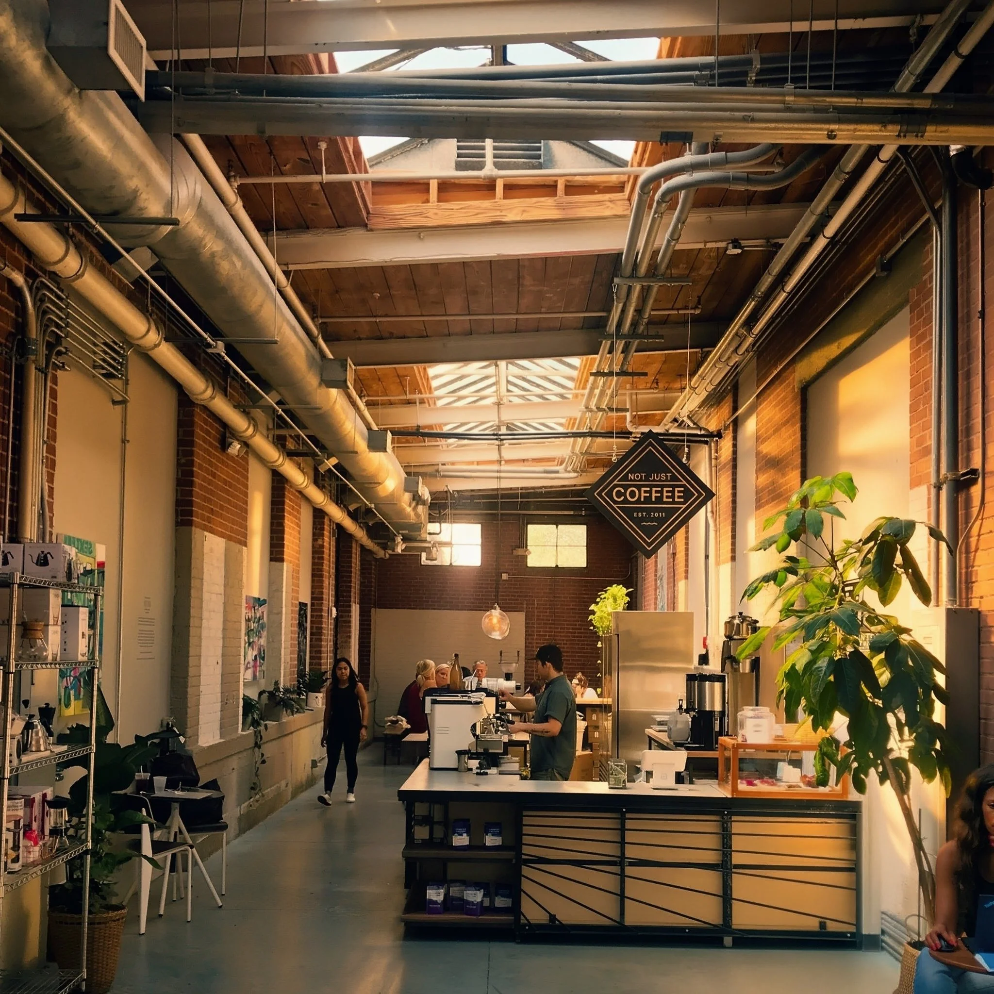 atherton-mill-not-just-coffee-interior-with-industrial-brick-and-wood-ceiling-south-end-charlotte-nc.jpg