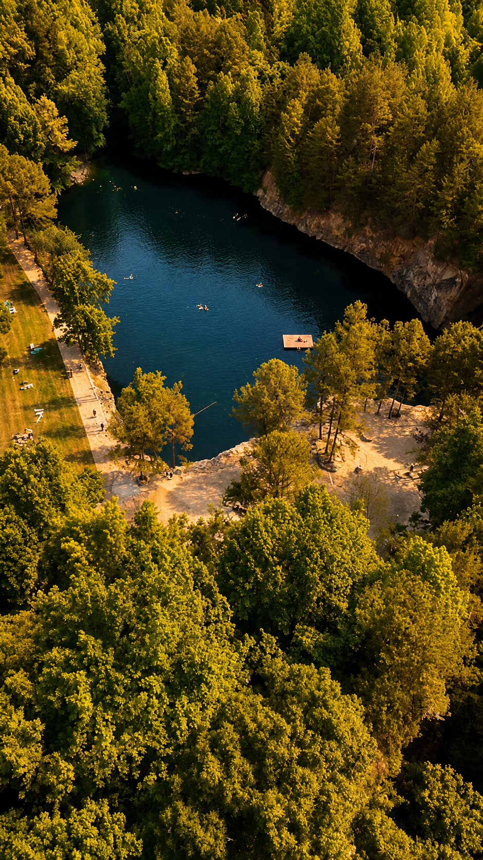golden-hour-quarry-lake-vertical-aerial.png
