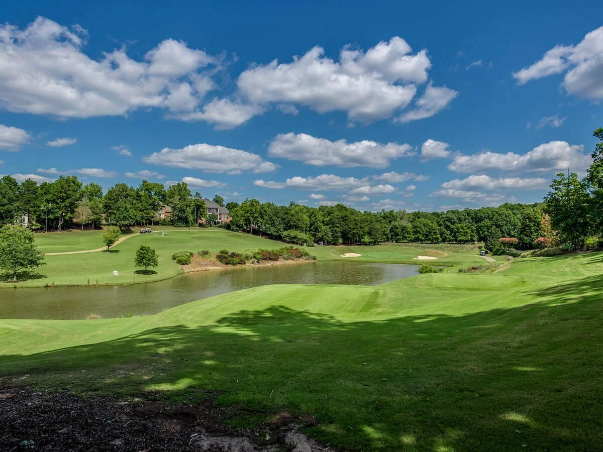 ballantyne-country-club-charlotte-nc-golf-course-fairway-with-pond-and-blue-sky.jpg