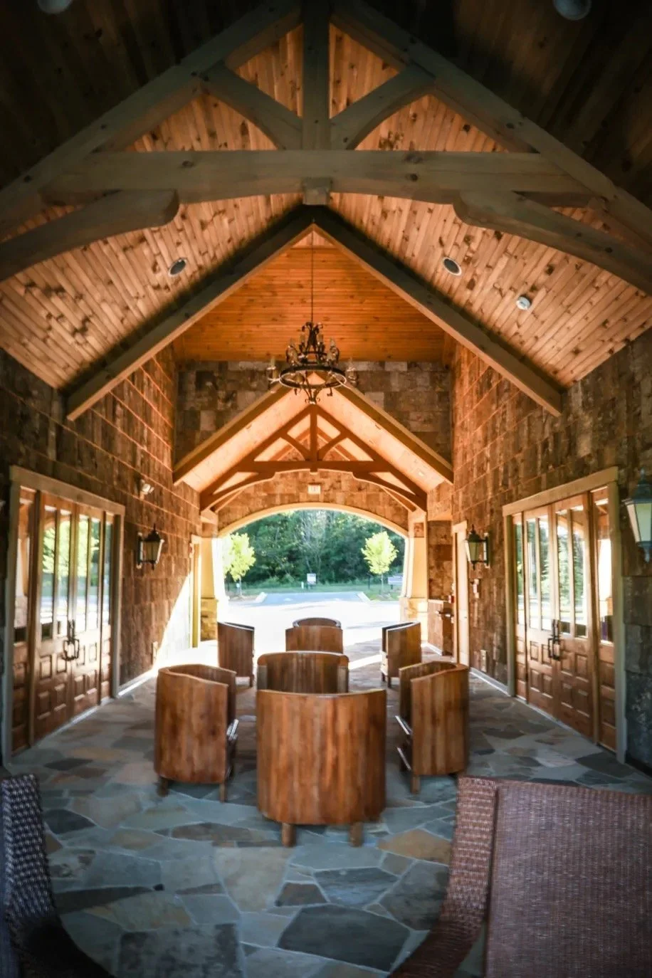 tree-tops-lancaster-clubhouse-interior-covered-porch-with-stone-walls-and-wood-ceiling-lancaster-sc.jpg
