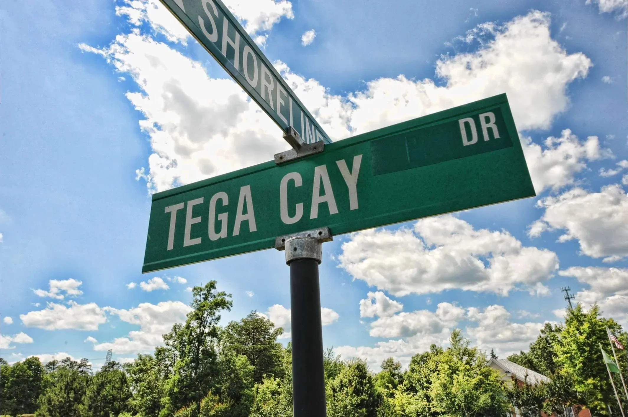 tega-cay-sc-street-sign-that-says-tega-cay-near-charlotte-nc.webp