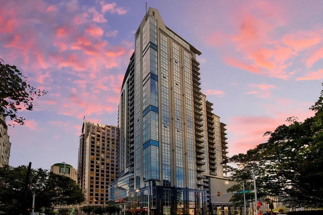 uptown-charlotte-nc-trademark-luxury-high-rise-condo-tower-at-sunset.jpg