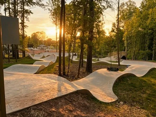 waxhaw-nc-pump-track-wavy-concrete-woods.jpg