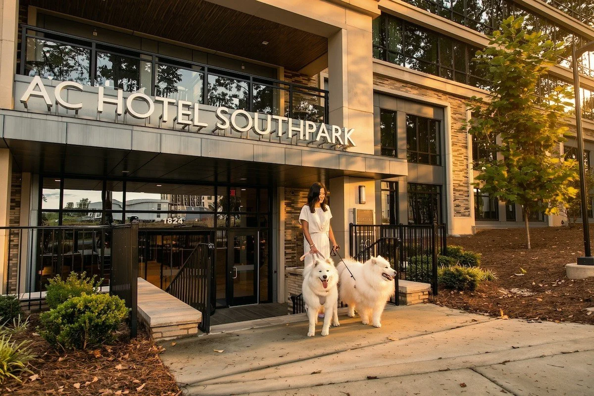 southpark-charlotte-nc-ac-hotel-entrance-woman-walking-dogs.jpg