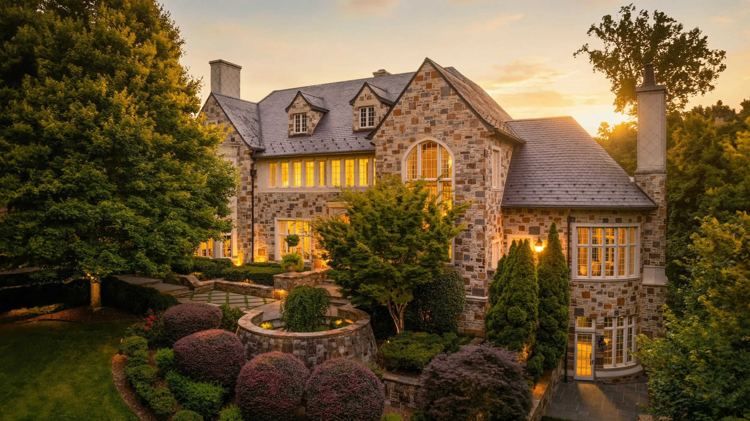 southpark-charlotte-nc-luxury-stone-home-landscaped-gardens-dusk.jpg