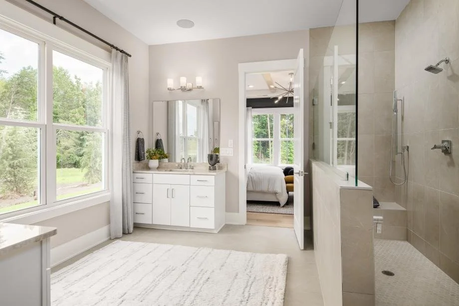 the-pines-at-sugar-creek-primary-bathroom-with-double-vanity-and-glass-shower-new-home-community-fort-mill-sc.jpg
