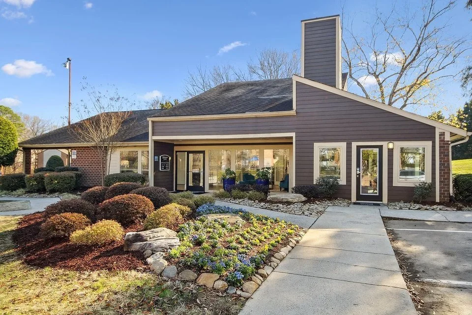 four-seasons-at-gold-hill-clubhouse-exterior-landscaped-entrance-55-plus-community-fort-mill-sc.jpg